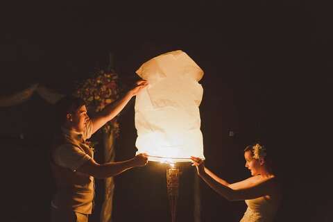 Lanterns on beach wedding